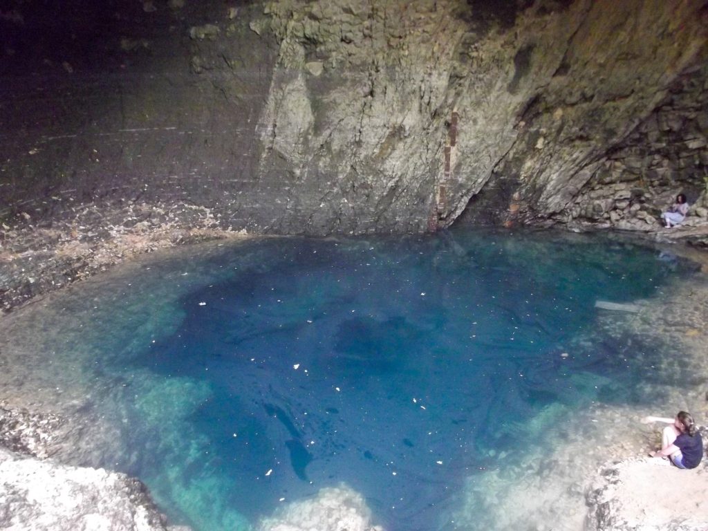 A murky pool inside a cave in France.