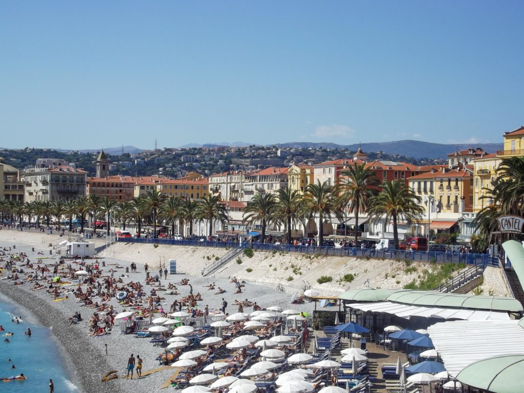 Hundreds of tourists on the beaches of Nice, France.