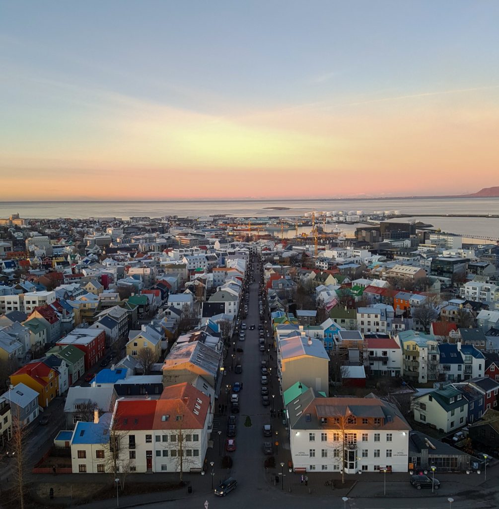 The colourful rooves of Reykjavik glow in the light of sunset.