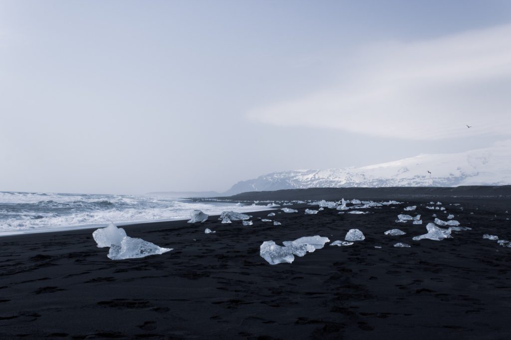 Several large ice blocks lie on the famous Diamond Beach.