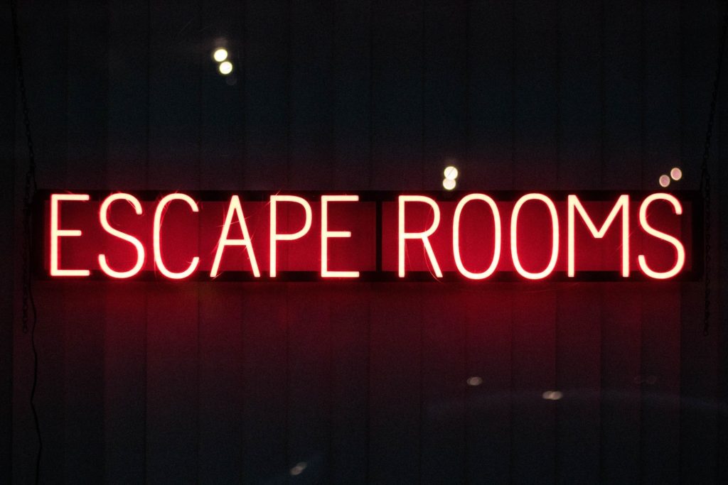 Escape room red neon sign.