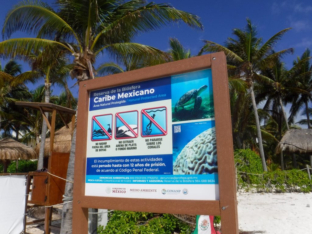 One of the many signs of rules at Akumal bay.