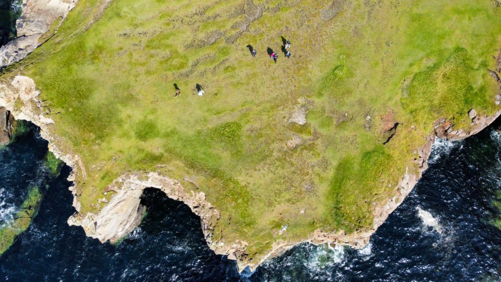 A view of the sunny Yesnaby Cliffs from above.