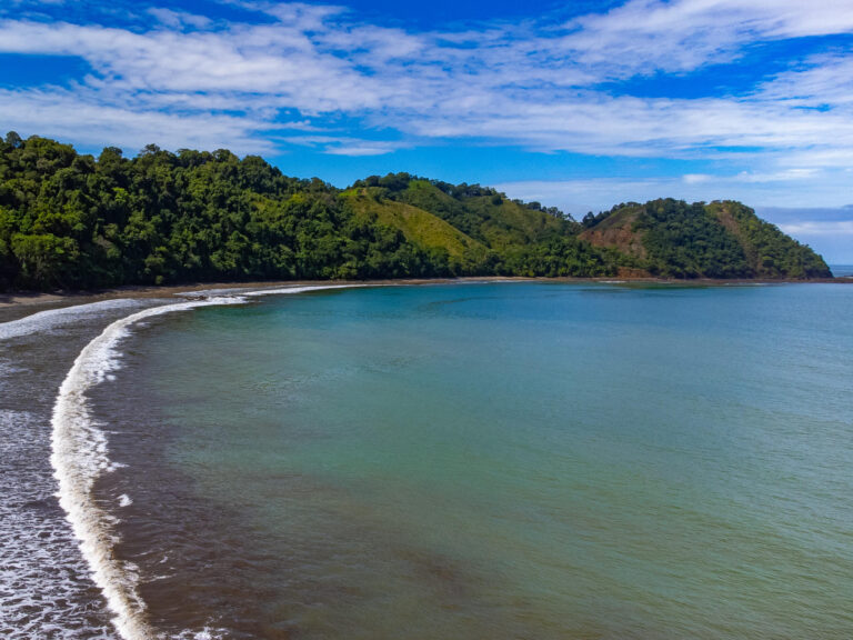 A drone view of a white sand beach in Costa Rica.