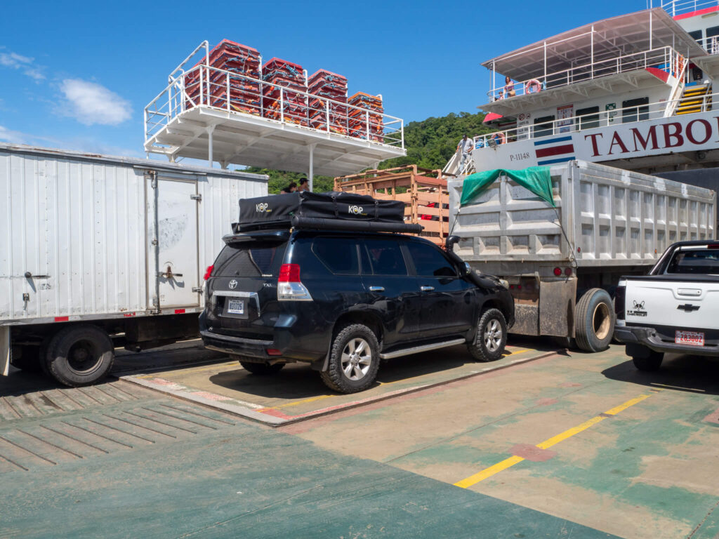 Vehicles parked up on a ferry in Costa Rica.