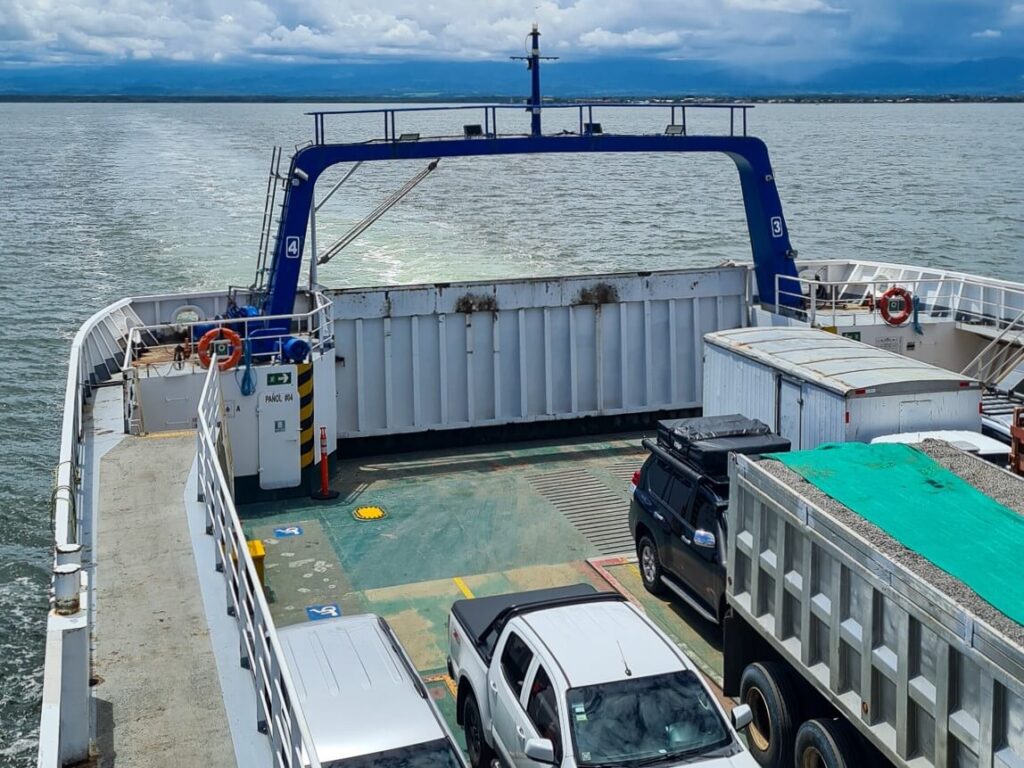 A view from the top deck of the Puntarenas ferry as it moves across the water.