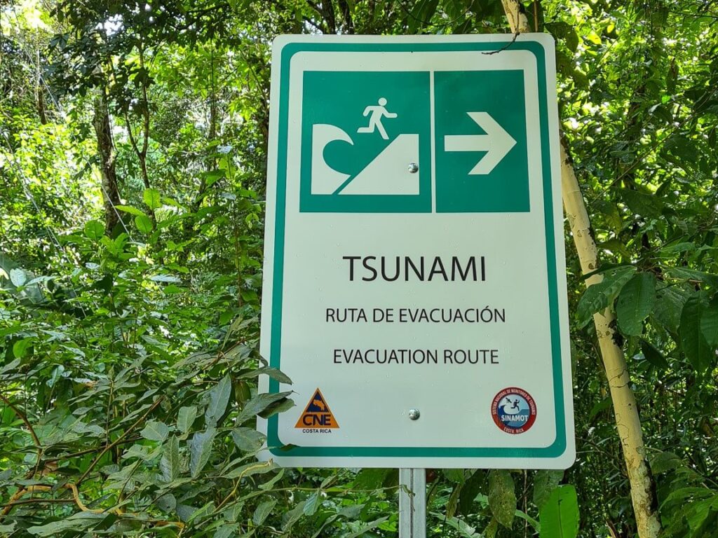 A sign that reads "Tsunami Evacuation Route".