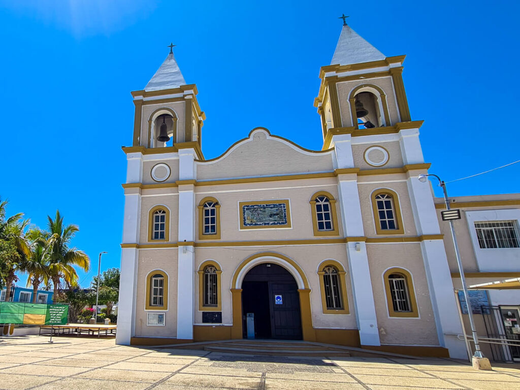 The front of the San Jose del Cabo Cathedral with its classic colonial architecture. Not a person can be seen.