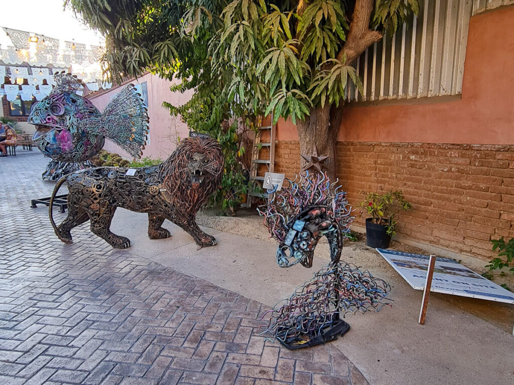 Metal sculptures of animals decorate a street in San José del Cabo.