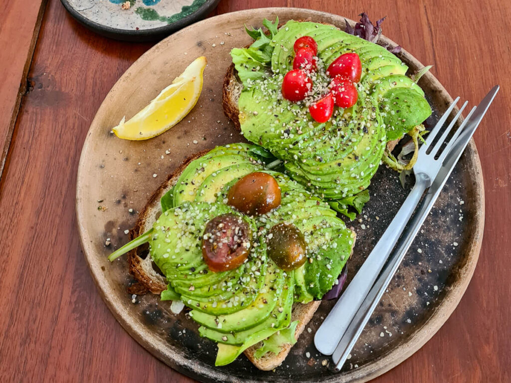 Avocado toast on a plate in a café in Isla Holbox.