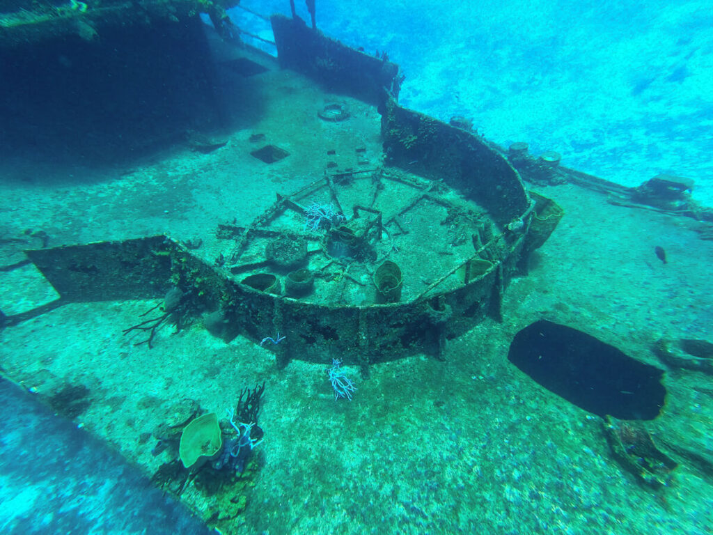 A shipwreck underwater at a dive site off Isla Cozumel.