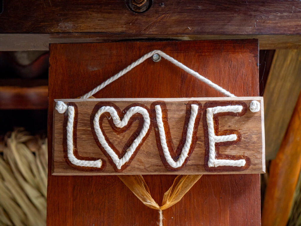 A hanging decoration reads "Love" and the "o" is a love heart.