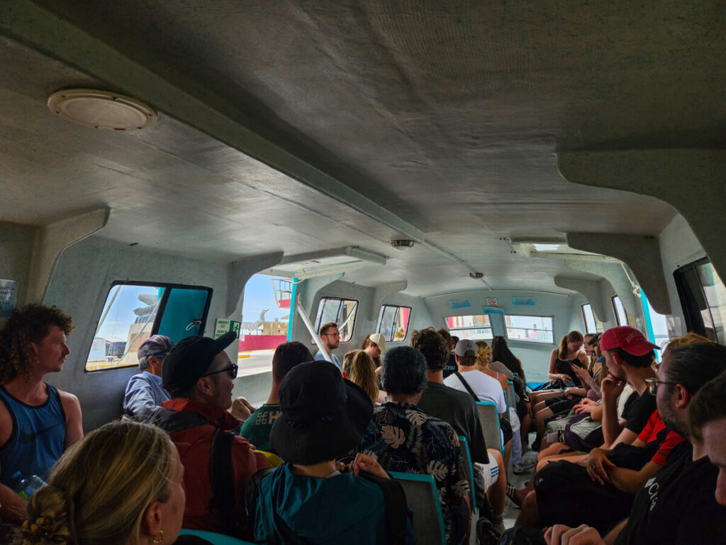 Passengers filling up every seat on the small ferry from Chetumal to San Pedro, Belize.