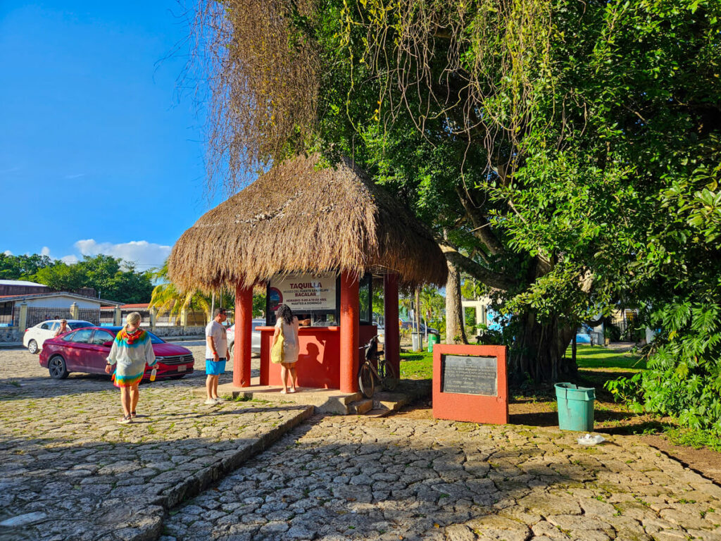 The ticket office at Bacalar Fort: a small hut covered by a palapa-style roof.
