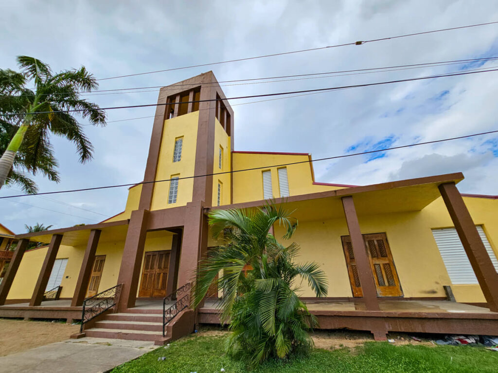 A yellow church in Dangriga, Belize.