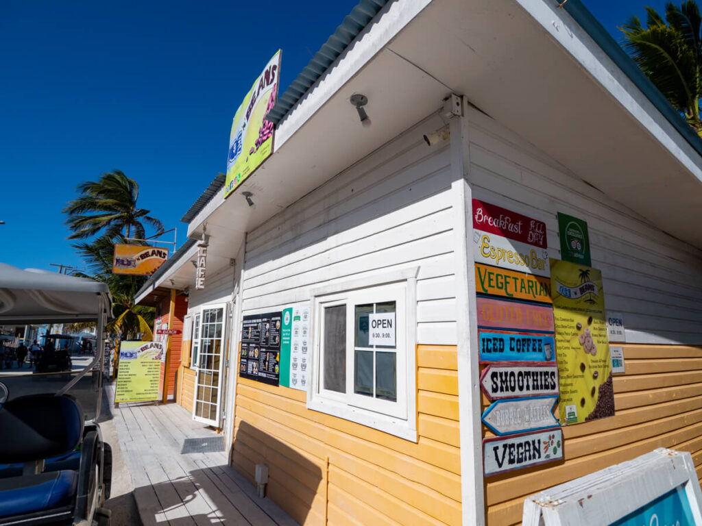 Ice and Beans, a coffee shop right on the sand of the beach in Caye Caulker. They offer a variety of vegetarian, vegan, and gluten free food and drink options.
