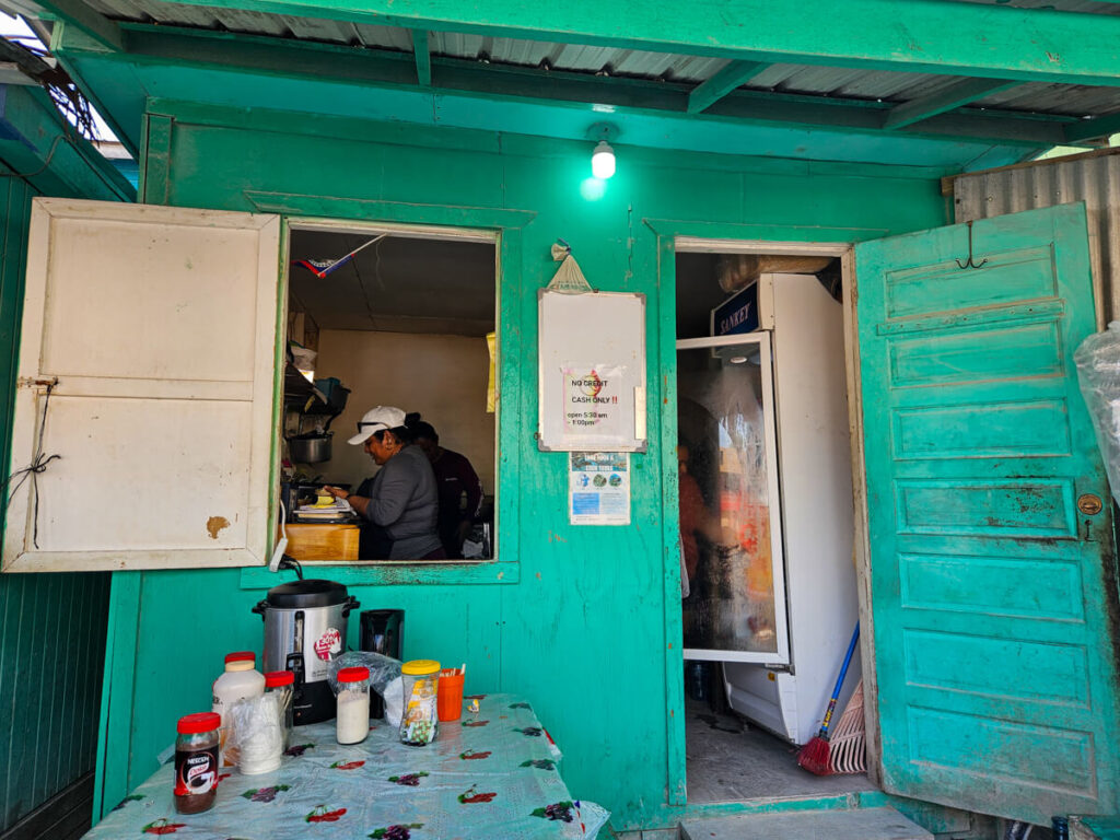 A place popular with locals, Jenny's To Go Food serves the best fry jacks in Caye Caulker. It consists of a single table with sauces and toppings on top and a latch to place your order to the small kitchen.