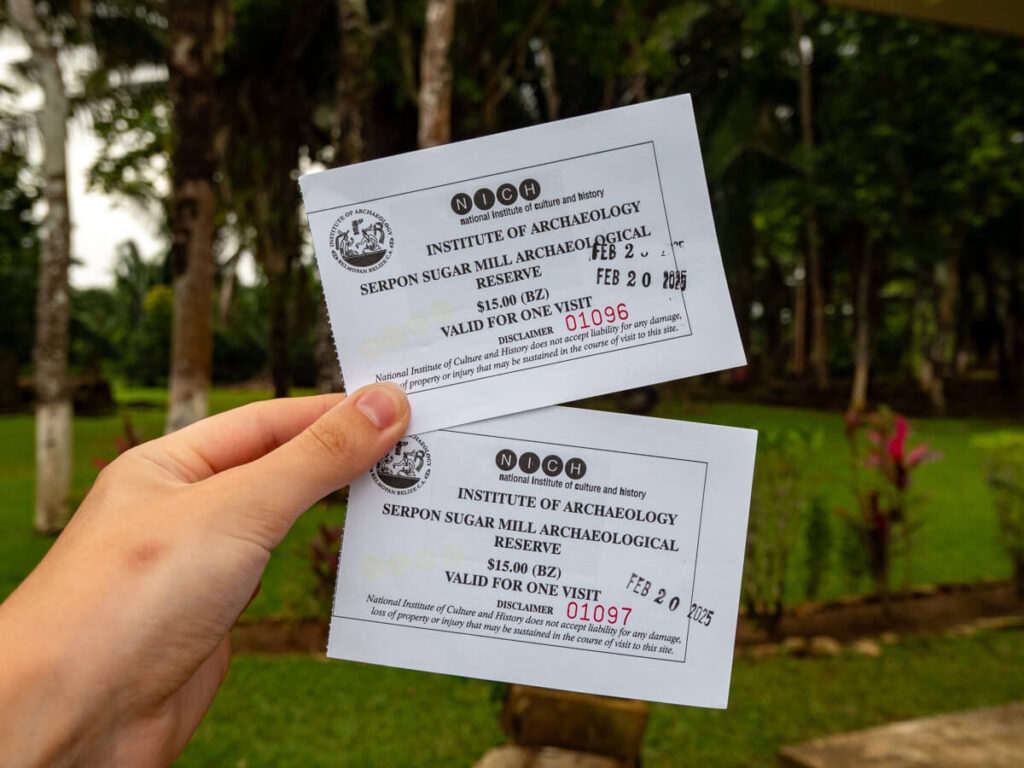Lucy holding Serpon Sugar Mill entry tickets.