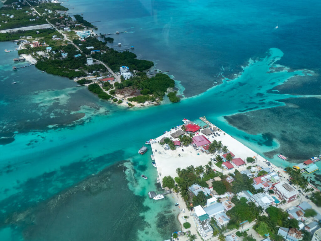 An aerial view of the Split - a gap in the land of Caye Caulker where a channel runs through to the sea.