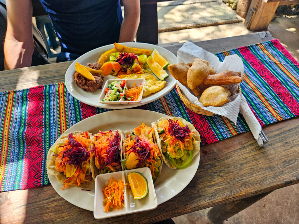 Colourful vegan tacos and fryjacks served in San Ignacio Market.