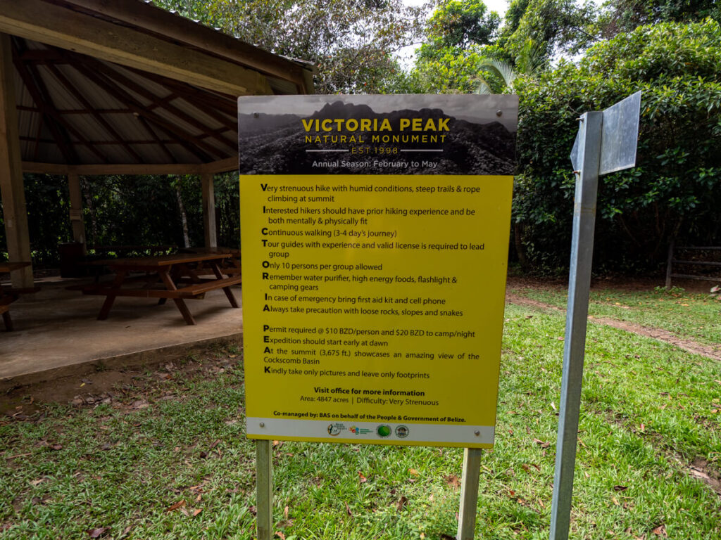 A sign about the rules for hiking to Victoria Peak Natural Monument in Cockscomb Basin Wildlife Sanctuary.