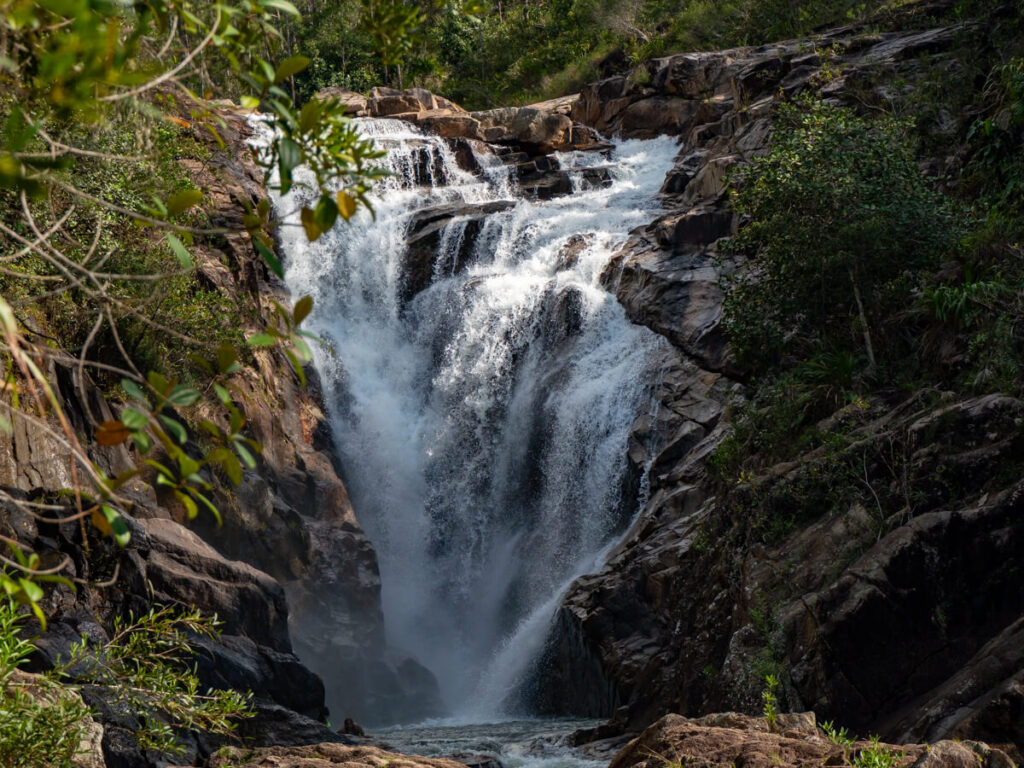 Water cascading over the huge Big Rock Falls waterfall in the Mountain Pine Ridge Forest Reserve.