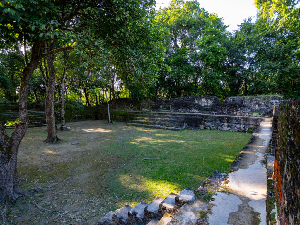 A grass-covered stone courtyard in Cahal Pech, San Ignacio's Mayan ruins.