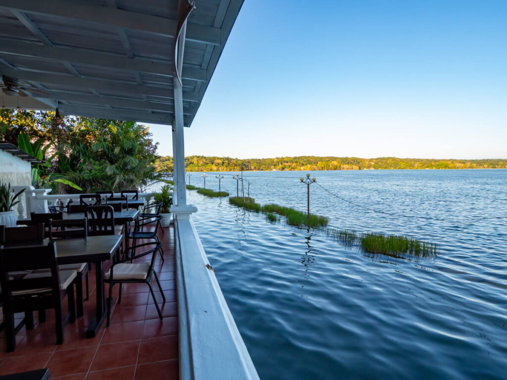 A restaurant on the waterfront of Isla de Flores, with views of Lake Peten Itza.