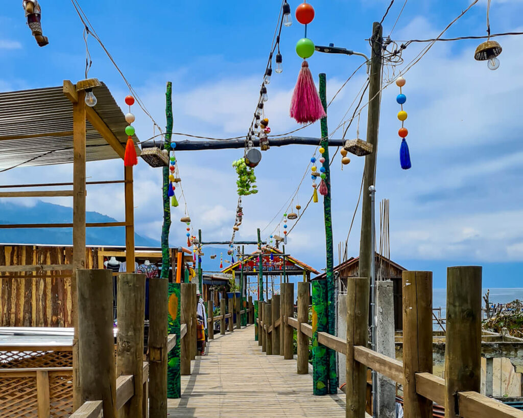 A dock with colourful decorations on Lake Atitlán, Guatemala.