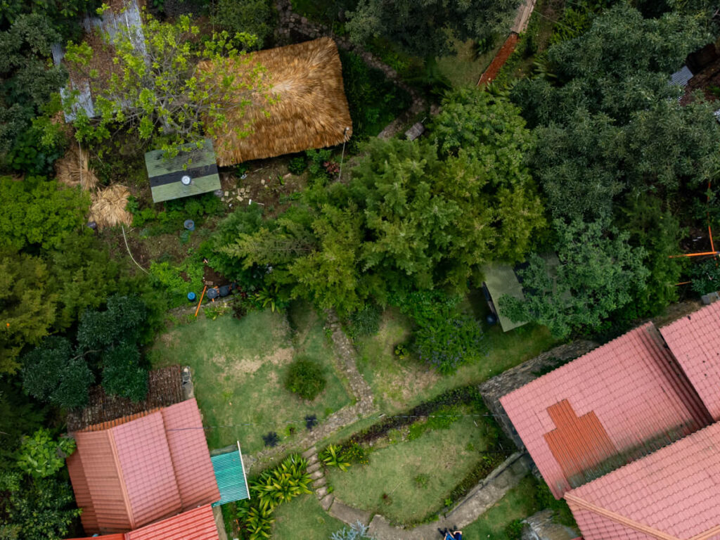 A drone shot of the bungalows in Eco-Hotel Mayachik´ in San Juan La Laguna, Lake Atitlán.