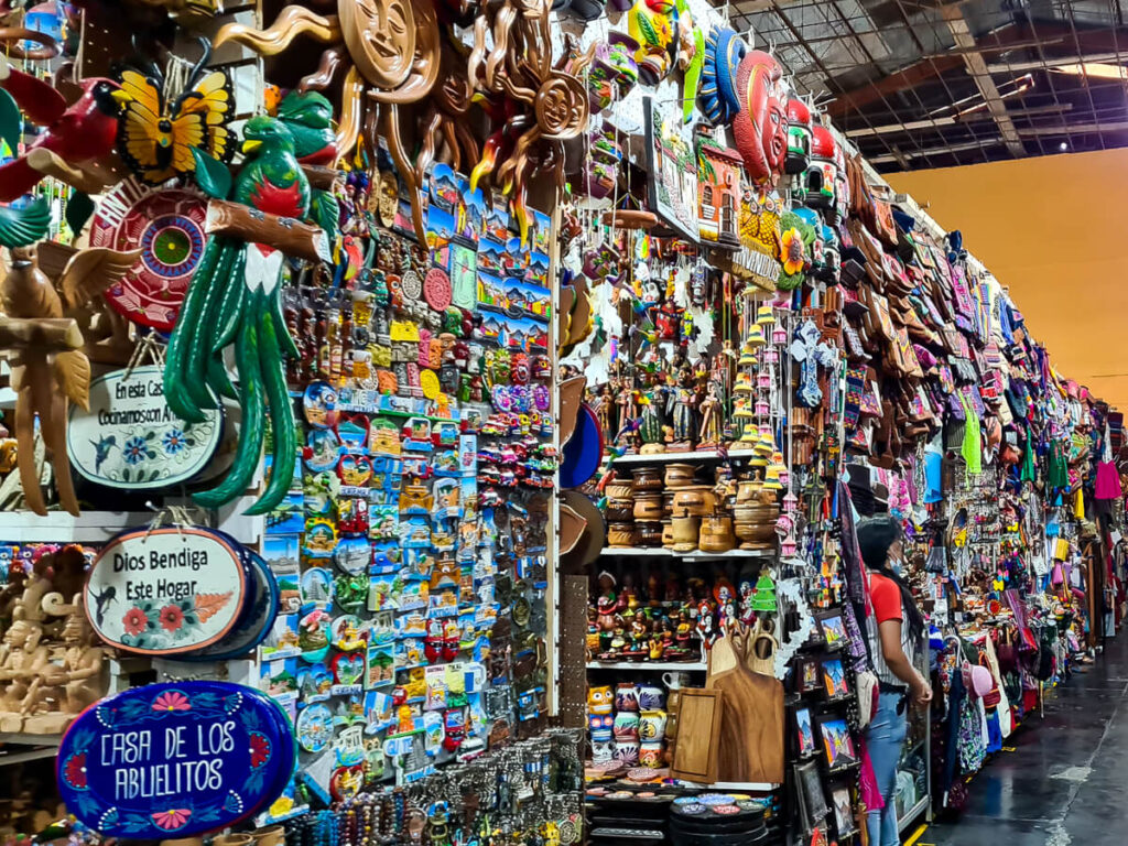Shelves of souvenirs like magnets in a market in Antigua, Guatemala.