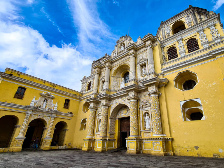 The yellow façade of the beautiful La Merced Church in Antigua, Guatemala.
