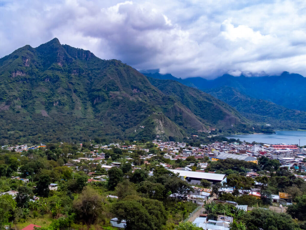 The small town of San Juan La Laguna nestled at the base of a mountain on Lake Atitlán, Guatemala.