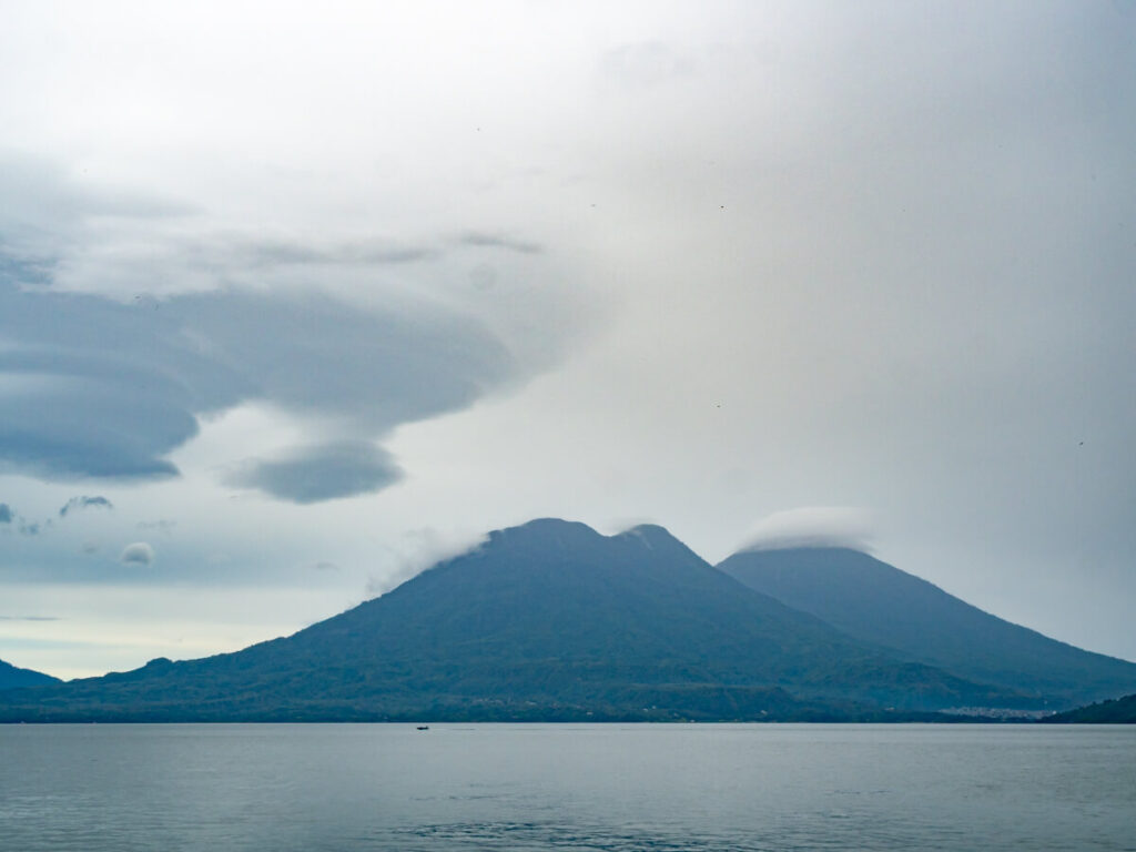The dramatic Atitlán, and Tolimán Volcanoes on Lake Atitlán, Guatemala.