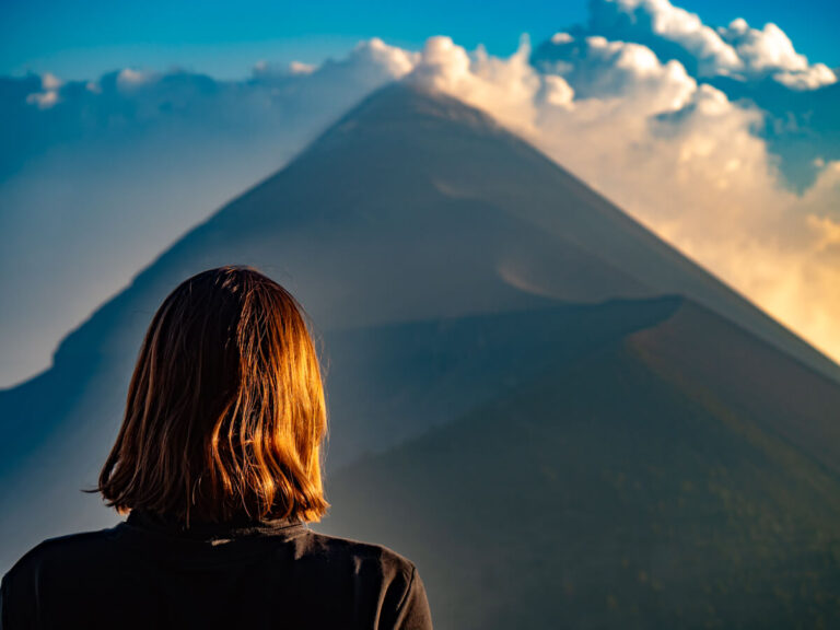 Lucy taking in the view of the impressive Fuego Volcano at sunset.