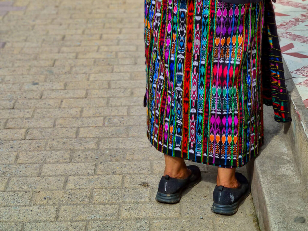 A colourfully embroidered skirt (huipil) worn by an indigenous Maya woman in  Lake Atitlán, Guatemala.