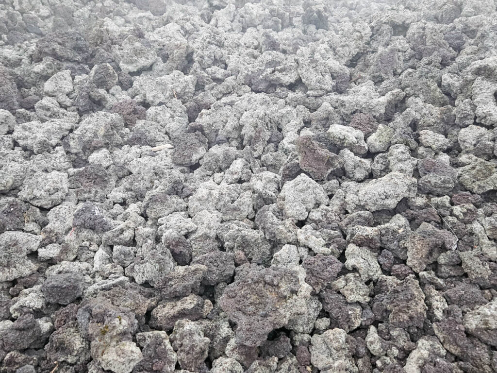 Black lava rocks on Pacaya Volcano.