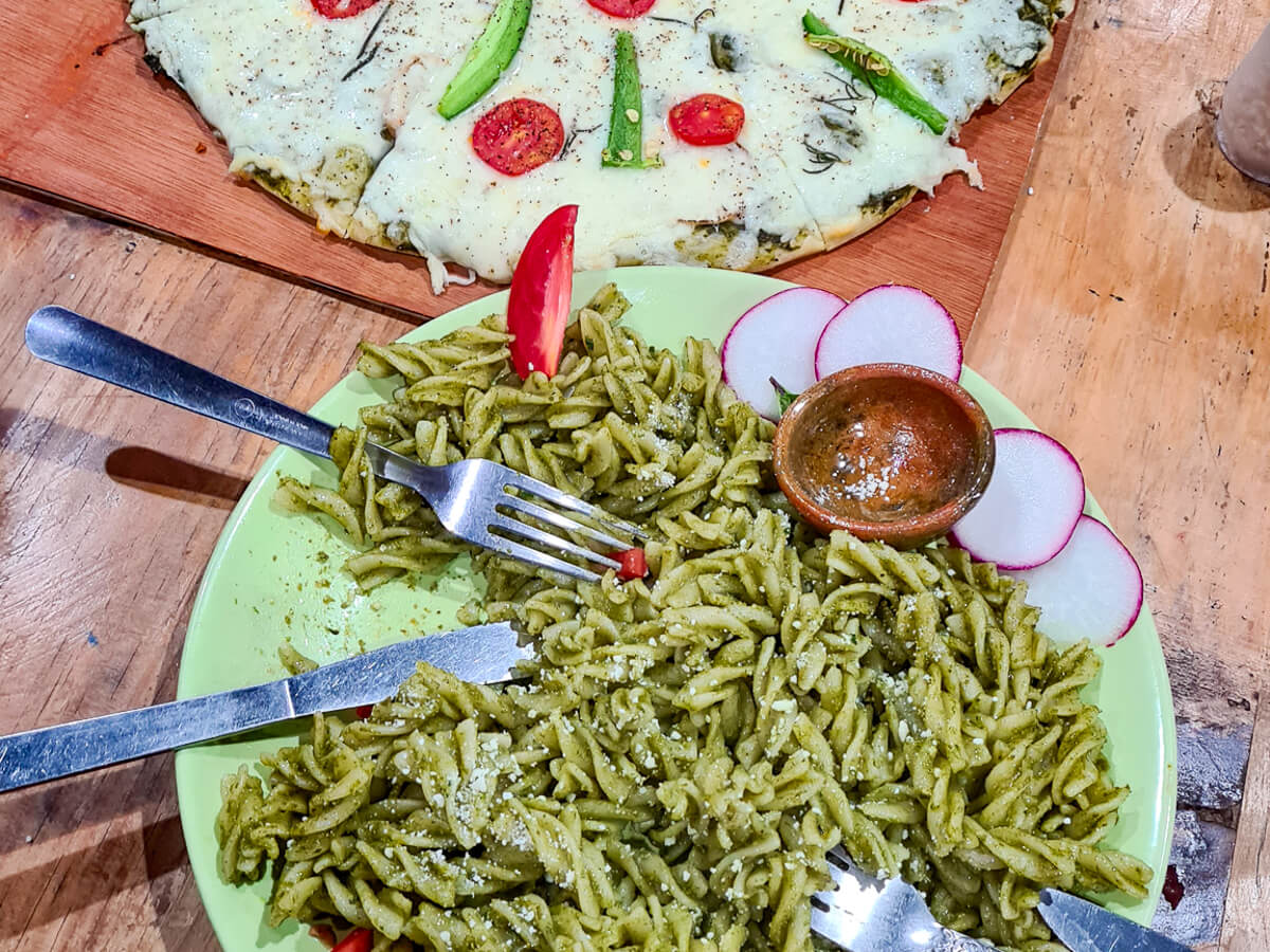 A plate of pesto pasta in the vegetarian restaurant at Eco-Hotel Mayachik´ in San Juan La Laguna, Lake Atitlán.