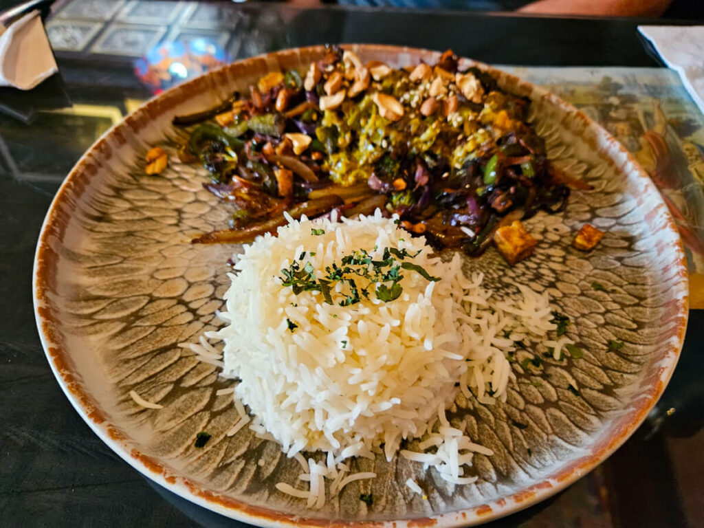 A plate of noodles and rice in Samsara, one of the best vegan restaurants in Antigua, Guatemala.