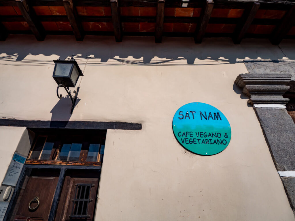 A sign on the wall of Sat Nam, one of the best vegetarian restaurants in Antigua, Guatemala.