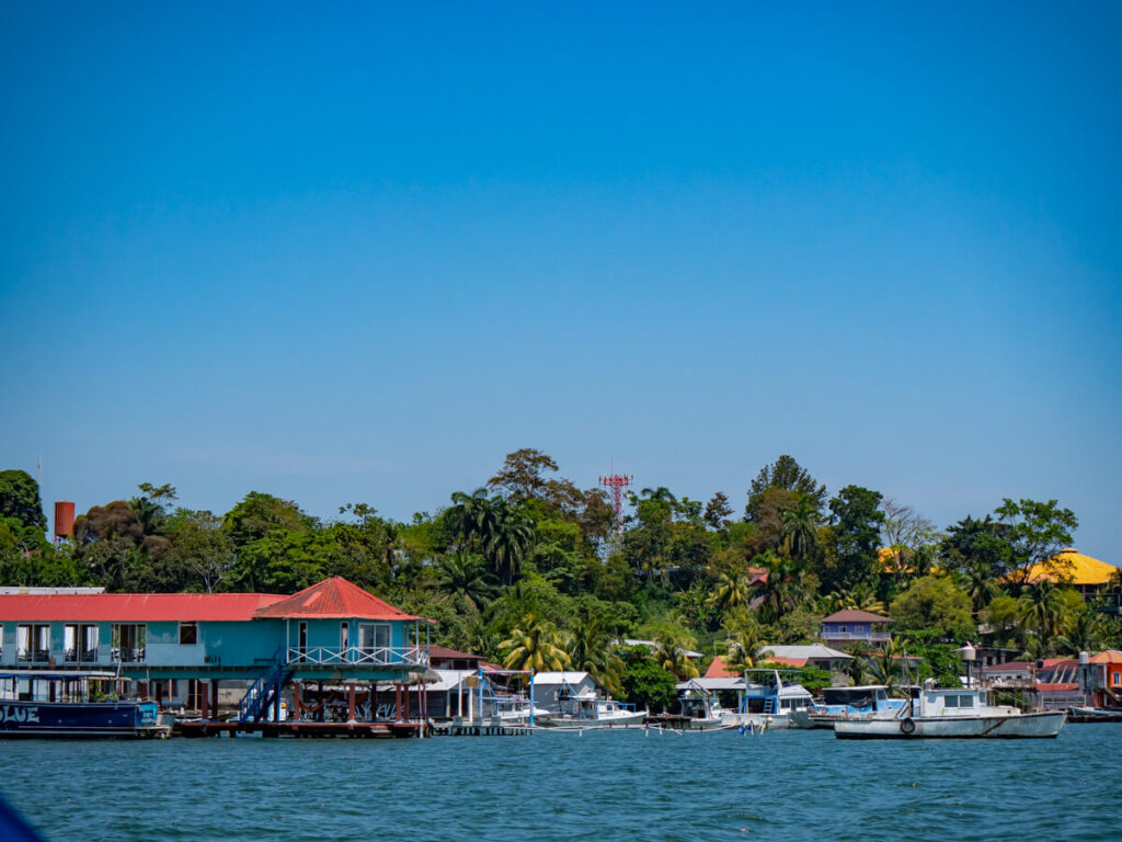 Waterfront buildings lining the coast in Livingston, Guatemala.