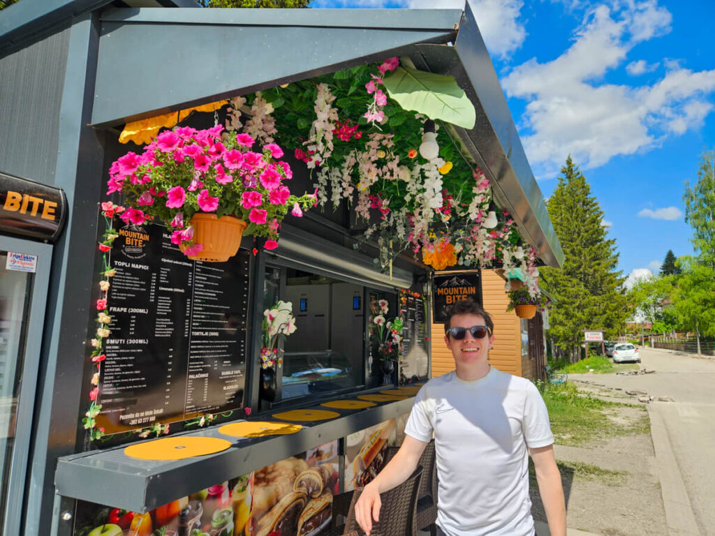Dan standing outside a food hut in Žabljak.