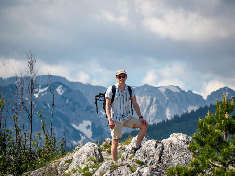 Dan hiking in the mountains on the Ćurevac Trail in Durmitor National Park.