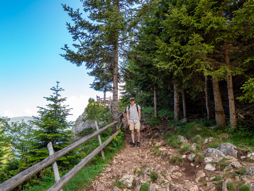 Dan standing on the rocky trail that leads to Ćurevac Peak.