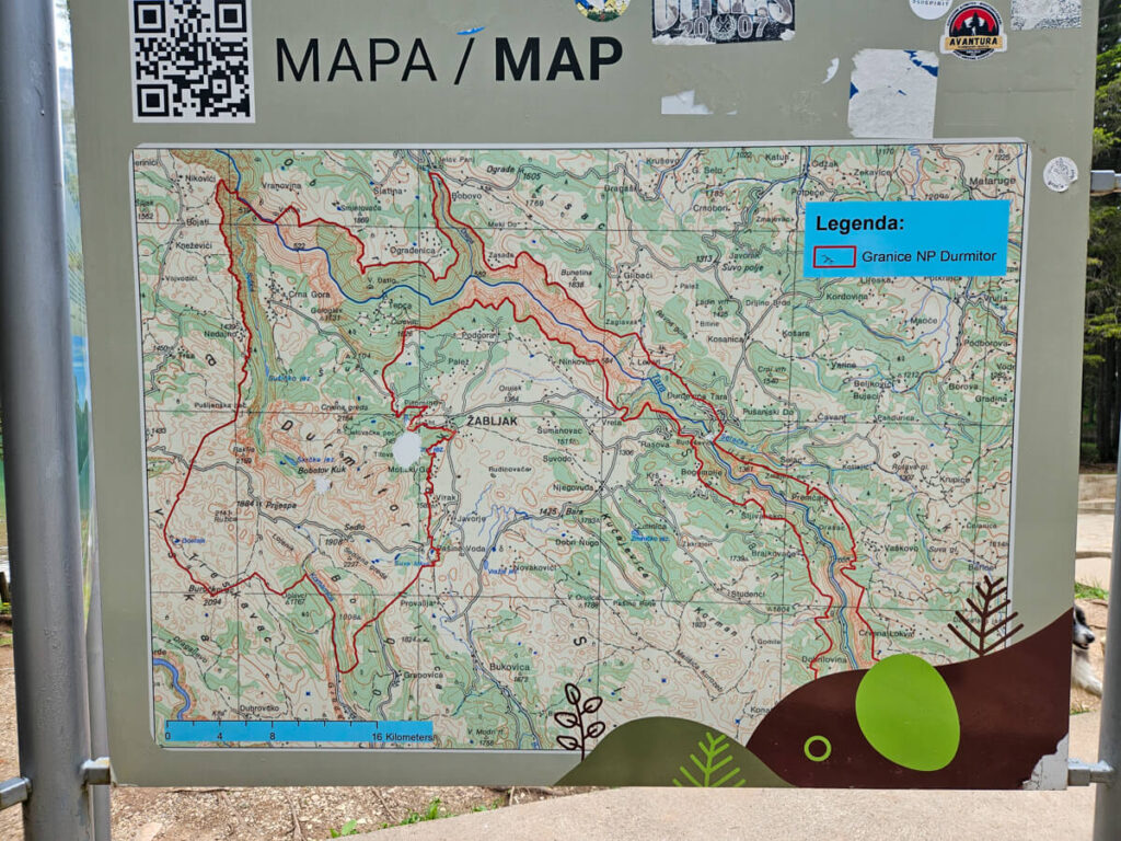 A sign displaying a map of Durmitor National Park's boundaries.