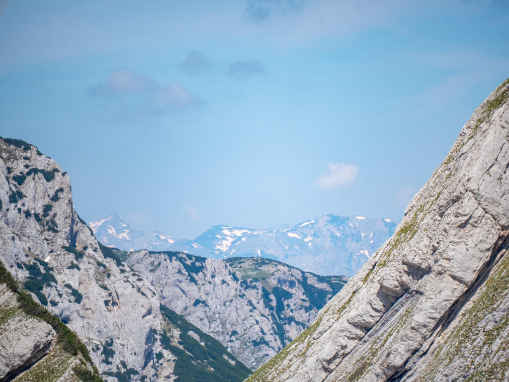 Layers of limestone mountains leading into the distance, viewed from Bobotov Kuk, one of the best hikes in Durmitor National Park.