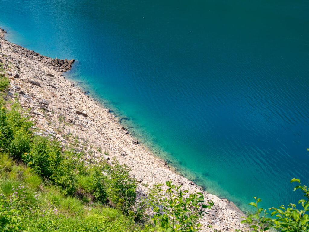The shore of Piva Lake as viewed from above.