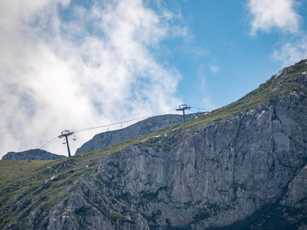 A ski lift climbing the steep face of Savin Kuk, a peak in Durmitor National Park.
