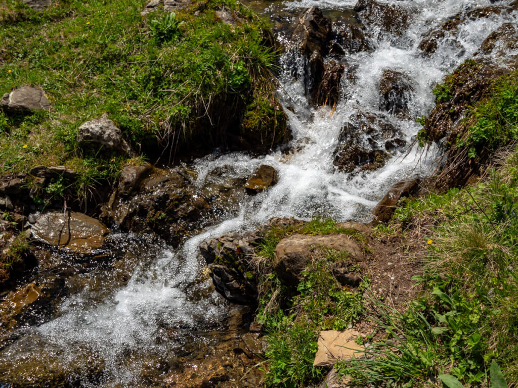 Water gushing through a stream on the Three Peaks trail in Prokletije National Park.