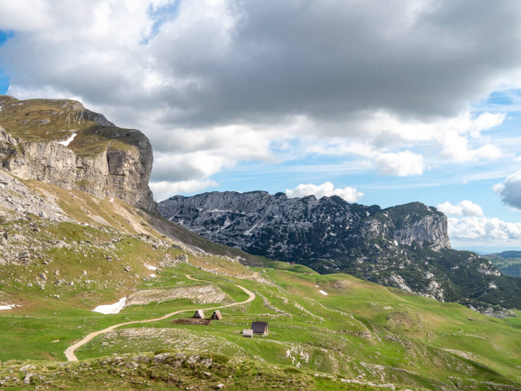 A winding road through a valley in Durmitor National Park.